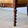Антикварное кресло с резным декором