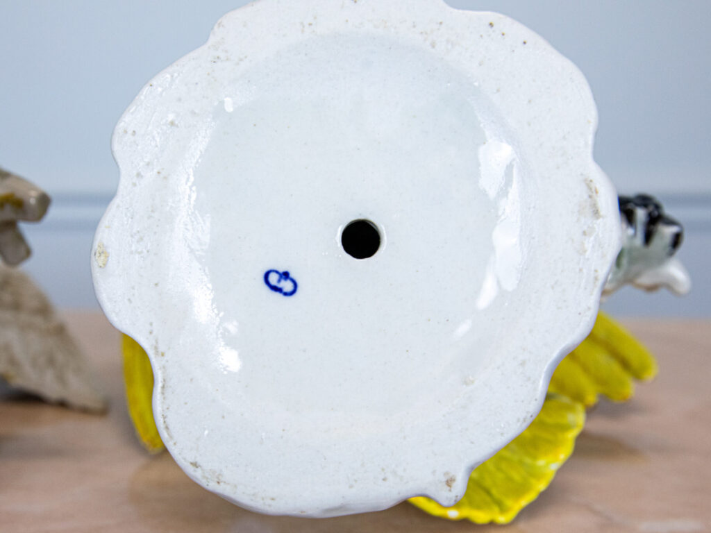 Вінтажні порцелянові папуги