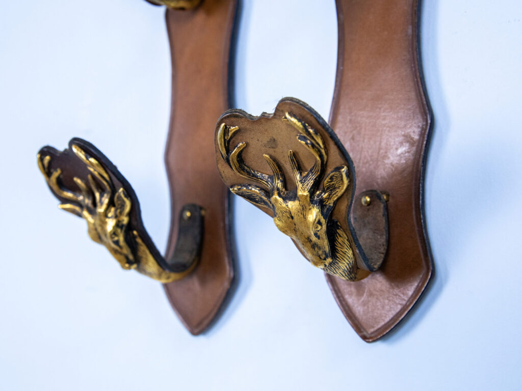 Настінні тримачі/вішаки для зброї