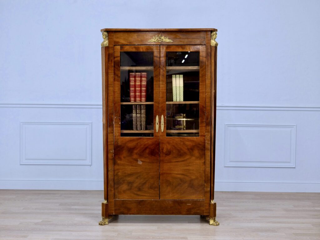 Антикварна книжкова шафа в стилі Ампір